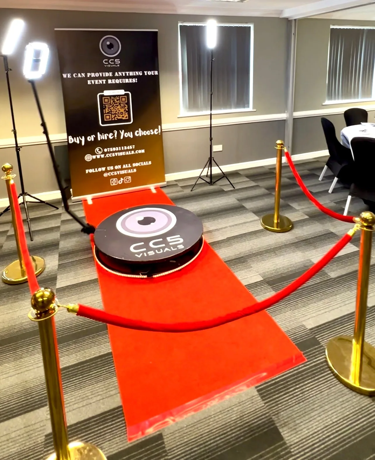 Red carpet and stanchions in a venue